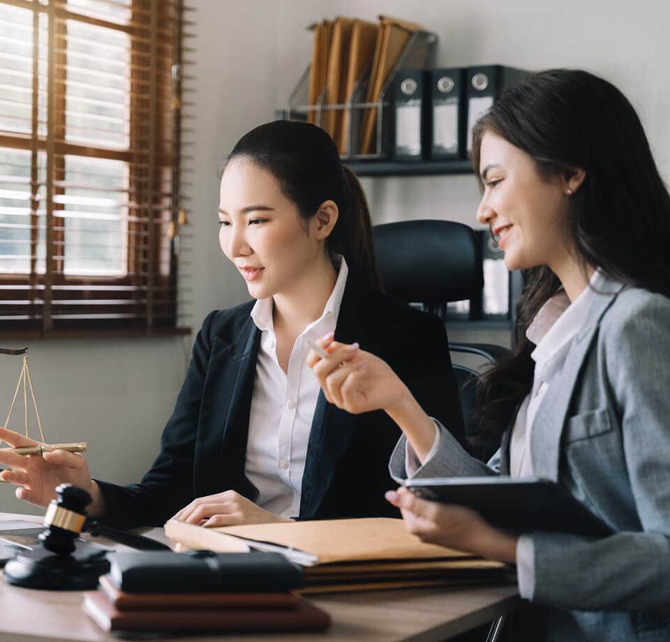 lawyer and businessman or judge consult with clien J8HZHCF